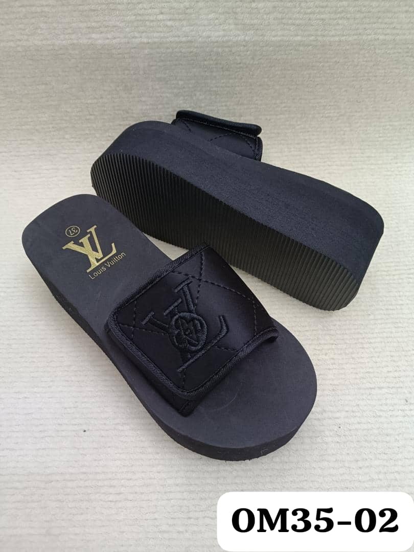 fad828f2-e4cf-4872-bca5-d060505b02bd-2 LV FLUFFY HIGH SOLE SLIPPERS - Image 1